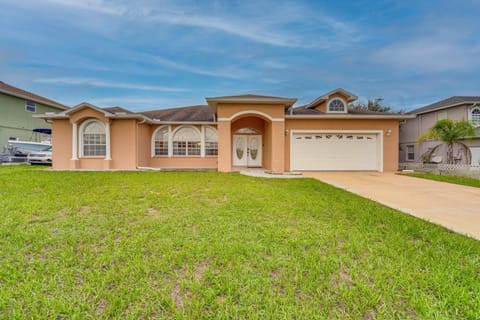 Haines City Vacation Rental | 4BR | 3BA | 2,500 Sq Ft | 1 Small Step to Enter