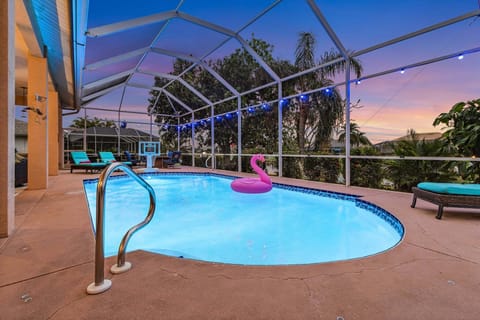 heated pool inside screen enclosure