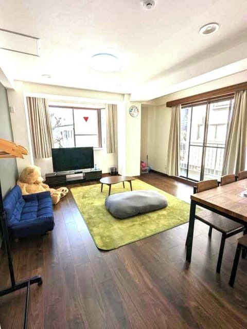 A spacious living room with plenty of sunlight