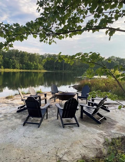 Enjoy roasting s'mores at the fire pit next to the lake.