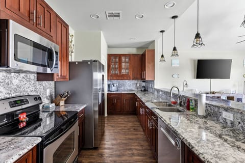 Fully equipped kitchen with stainless steal appliances and granite countertops. 