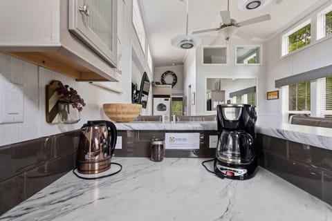 Kirch is stocked with coffee pot and hot water appliance