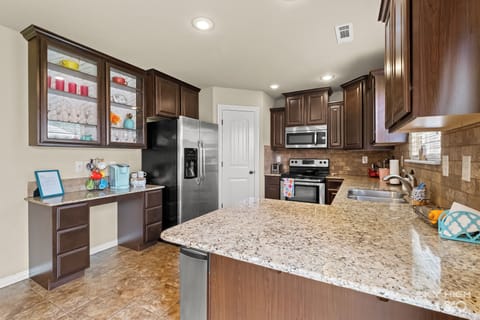 Fully stocked kitchen, coffee bar,  and walk-in pantry!