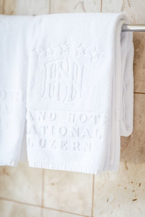 Designer toiletries, hair dryer, bathrobes, slippers