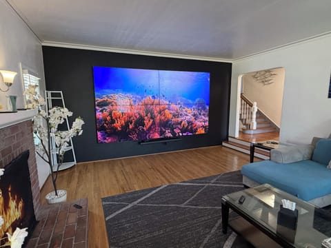 Living room with 150”  Video wall and surround sound