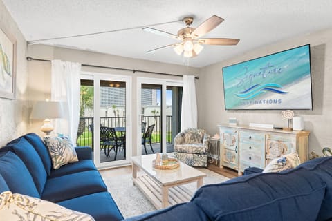 Living Room with Queen Sized Sleeper Sofa and Balcony Access