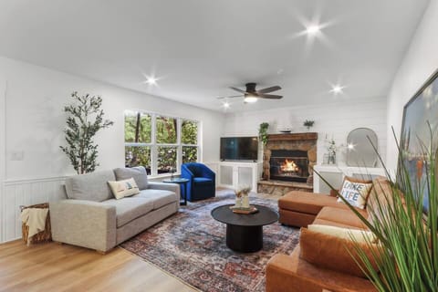 Unwind in the living room on a vegan leather sofa and overstuffed love seat