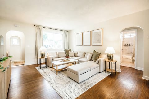 Unwind in the bright and airy living room, featuring a spacious sofa. Enjoy abundant natural light streaming through the windows as you relax and enjoy  the big-screen smart TV. Update: ** Update Recliner added for Comfort and Recovery.