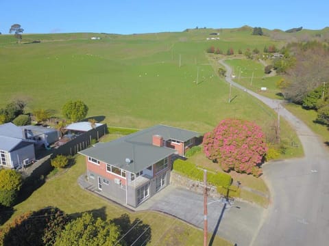 Aerial View Over Hilltop Home