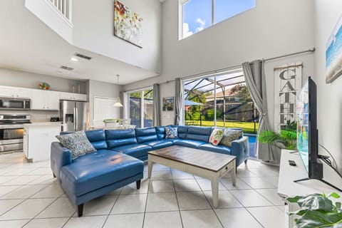 Relax in style with plush seating, a smart TV, and elegant décor — perfect for family movie nights or quiet evenings after exploring Orlando