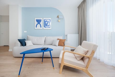 Comfortable Living Room with Sofa Bed and Smart TV | Book Now with RENTUJEMY