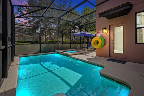 Enjoy a refreshing dip in your own private, screened splash pool with a cozy seating area.