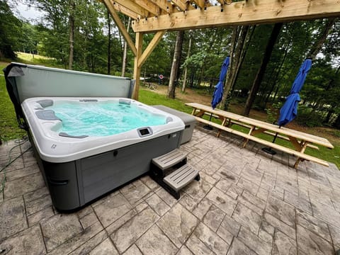 Hot tub with a view! This is a guest favorite, especially when they have been able to see wildlife passing through.