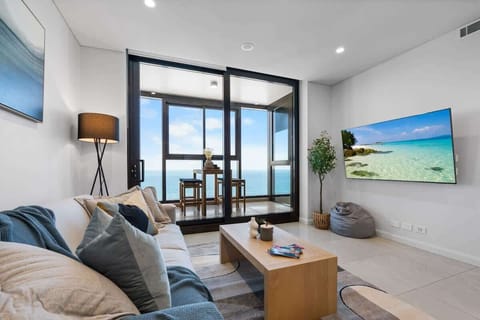 Imagine relaxing on the king sofa bed, watching the smart TV while listening to the soothing sound of waves crashing outside.