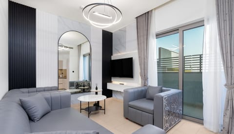 Comfort Apartment, 1 Bedroom, City View | Living area | 55-inch Smart TV with cable channels