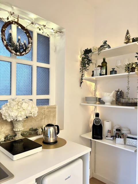 Mini-fridge, cookware/dishes/utensils