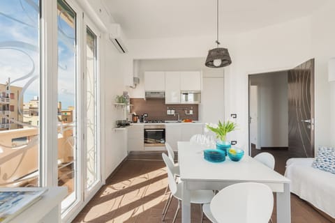 Deluxe Apartment, 3 Bedrooms, Balcony, Sea View | Living area | Flat-screen TV, DVD player