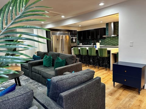 Living room/ kitchen view as you walk in