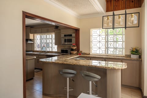 Comfort Double Room | Private kitchen | Fridge, stovetop, cookware/dishes/utensils