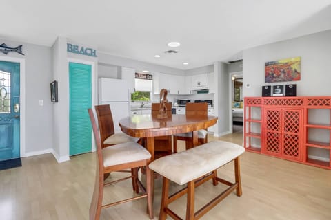 The open dining space efficiently flows right into the kitchen.