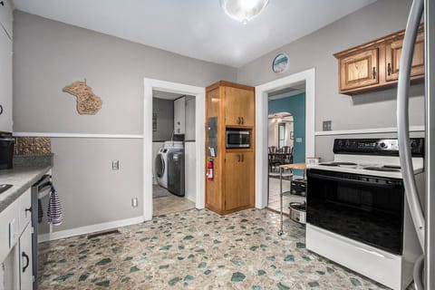 Kitchen - Kitchen showing entrance into main level bathroom/laundry room and entrance into the bonus room