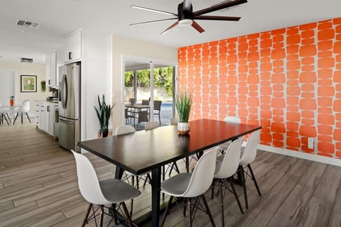 Share meals and memories in this bright dining room conveniently located next to the fully equipped kitchen.