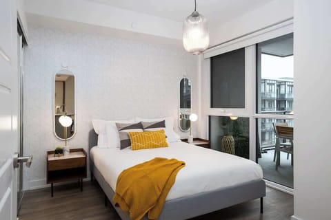 Master bedroom featuring a cozy queen bed