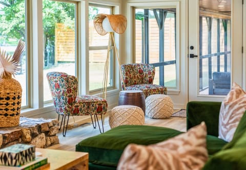 Cozy up in this comfortable nook, ideal for a morning coffee or an intimate conversation.