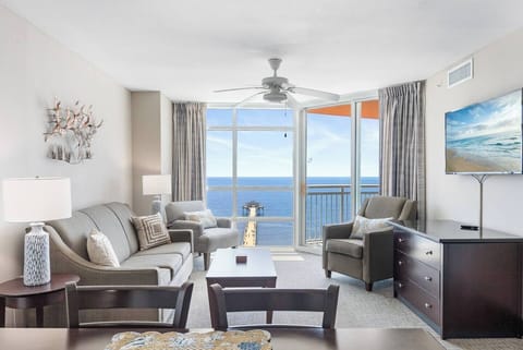 Enjoy the beautiful view of the ocean and Cherry Grove Fishing Pier from the living room, Primary Bedroom and Second Bedroom.