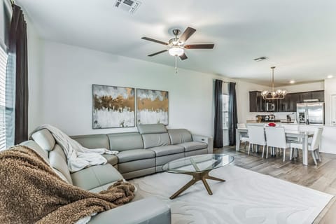 Living room with view of dining room and kitchen