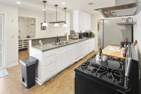 Kitchen with Gas Oven / Range, Bar Seating, Coffee Maker & More