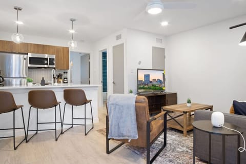 As you take a seat in the living room, the comfortable furniture and tasteful design make it easy to unwind.