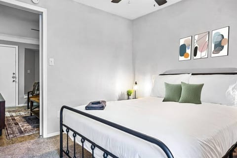 The bedroom’s serene ambiance invites you to relax, with a plush bed that promises a restful night's sleep.