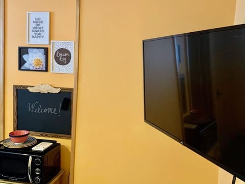 We invite you to watch a show or a movie on the 43" inch smart TV.