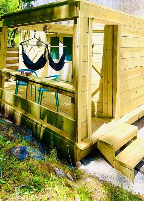 Swing a bit in your own hammock chair……you have your own private porch to chill and relax.