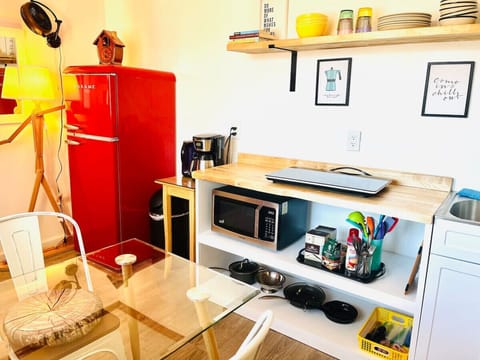 The custom made kitchenette offers plenty of space to prepare your quick meals.