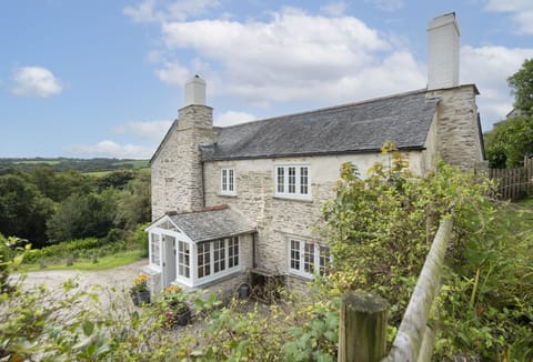 Welcome to The Old Farmhouse, settled peacefully in the rolling Cornish countryside