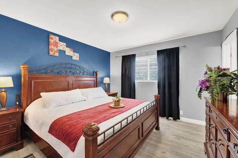 Unwind in this beautiful bedroom with a comfortable king-size bed.