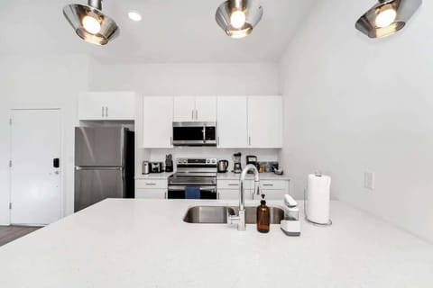 Cook up a storm in the fully equipped kitchen with modern appliances and all the essentials you need.