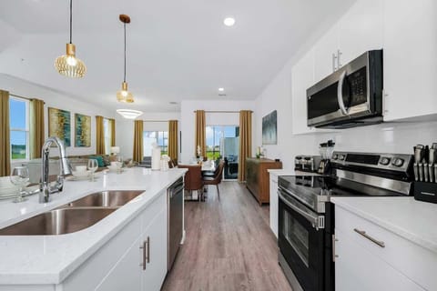 Whip up your favorite meals in the fully stocked kitchen, equipped with all the essentials.