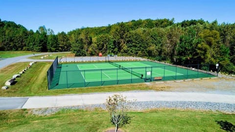 Enjoy access to community swimming pool, tennis courts, pickle ball, beach, and playground.