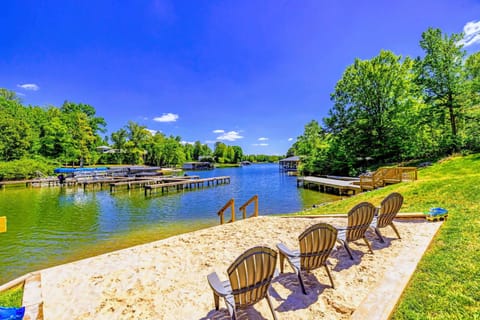 Private Beach - Adirondack chairs in the sand, the cove just steps away, and the dock ready when adventure calls.