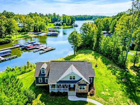 Charming lakefront home with a picturesque view of the water and marina, offering a perfect retreat in nature