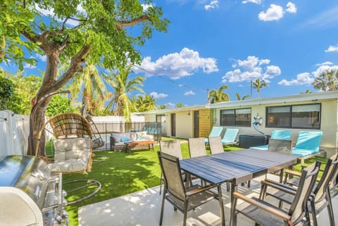 Whether you’re sipping a morning coffee or unwinding with an evening drink, the poolside area offers a relaxing retreat. Adjacent to the pool, a stylish outdoor dining set awaits, ideal for al fresco meals or casual gatherings under the stars.