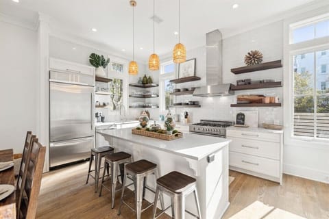Kitchen area and kitchen island with extra seating