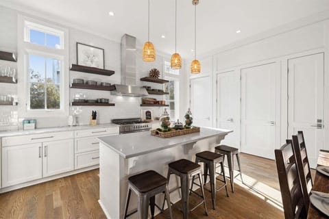 Kitchen area and kitchen island with extra seating