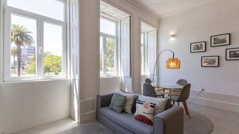 Bright and inviting living area featuring large windows that fill the space with natural light #bright #wonderful