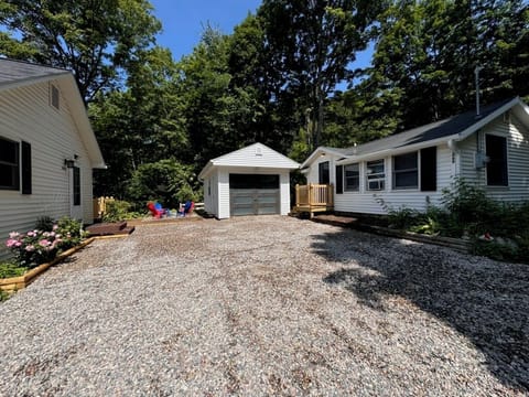Exterior and proximity to other cottage, this space is parking for the bigger cottage