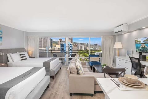 An overview of your beautiful studio condo with 2 queen-size beds.