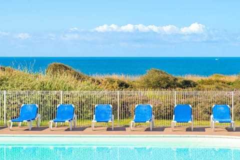 Enjoy seaside views right from the shared swimming pool.
